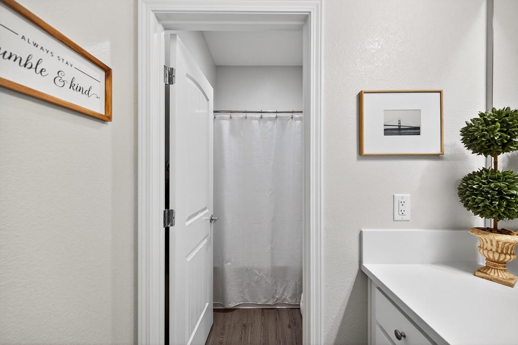 1397 Rio Grande Drive Plumas Lake, CA 95961 - Photo 24 of 54 a bathroom with a shower and a sink
