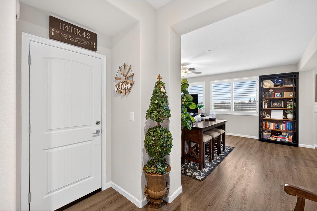 1397 Rio Grande Drive Plumas Lake, CA 95961 - Photo 25 of 54 a room with furniture and wooden floor