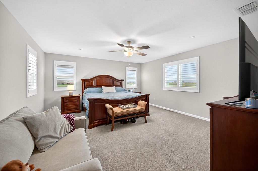 1397 Rio Grande Drive Plumas Lake, CA 95961 - Photo 40 of 54 a bedroom with furniture and a window