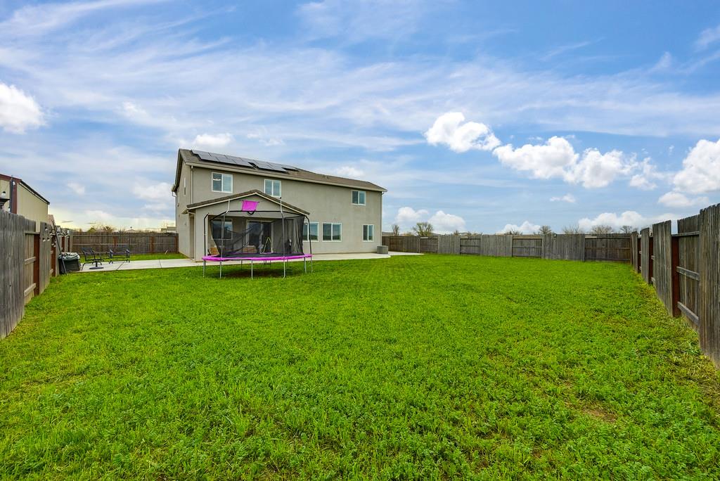 1397 Rio Grande Drive Plumas Lake, CA 95961 - Photo 49 of 54 a view of a house with a big yard