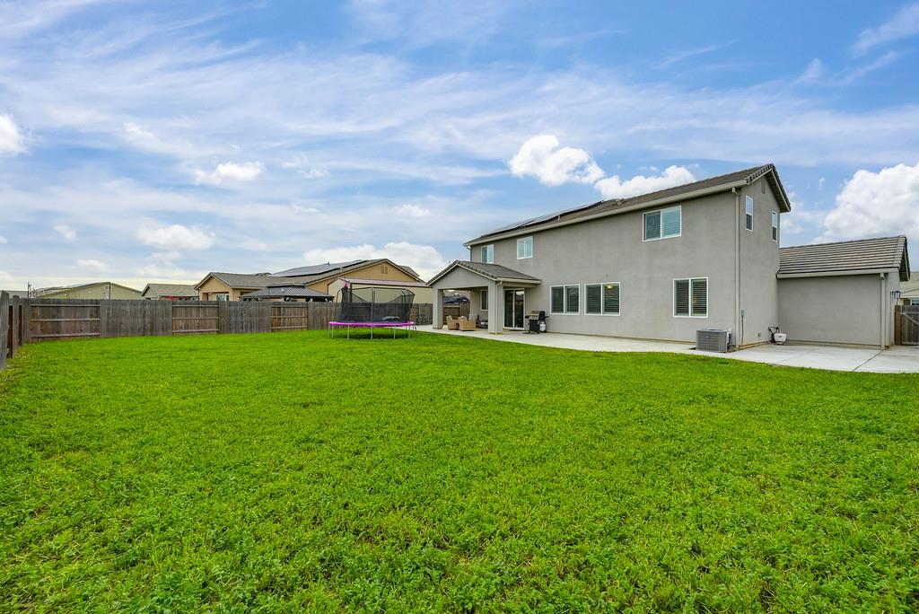 1397 Rio Grande Drive Plumas Lake, CA 95961 - Photo 51 of 54 a view of a house with a big yard