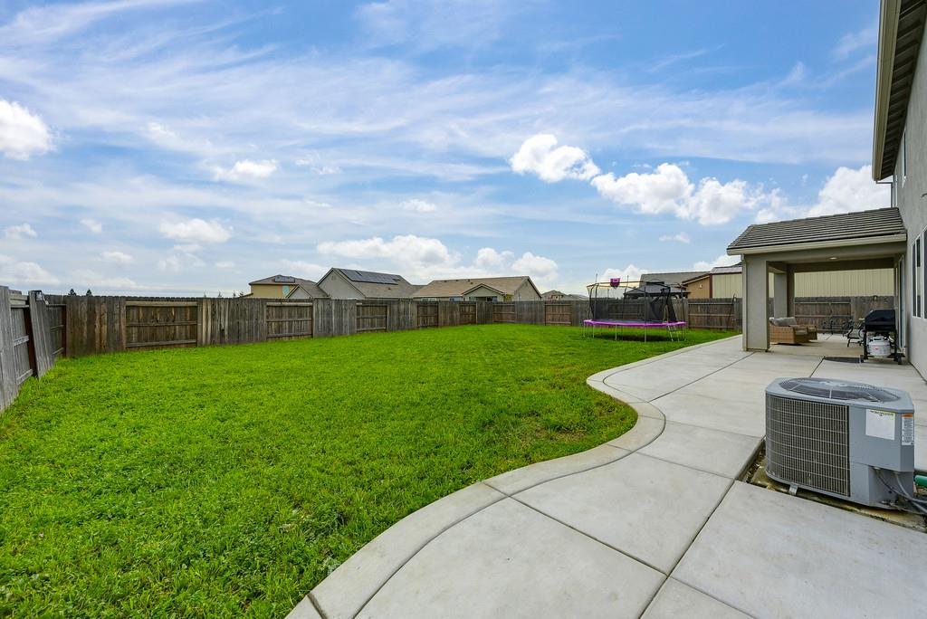 1397 Rio Grande Drive Plumas Lake, CA 95961 - Photo 52 of 54 a view of a garden with seating area