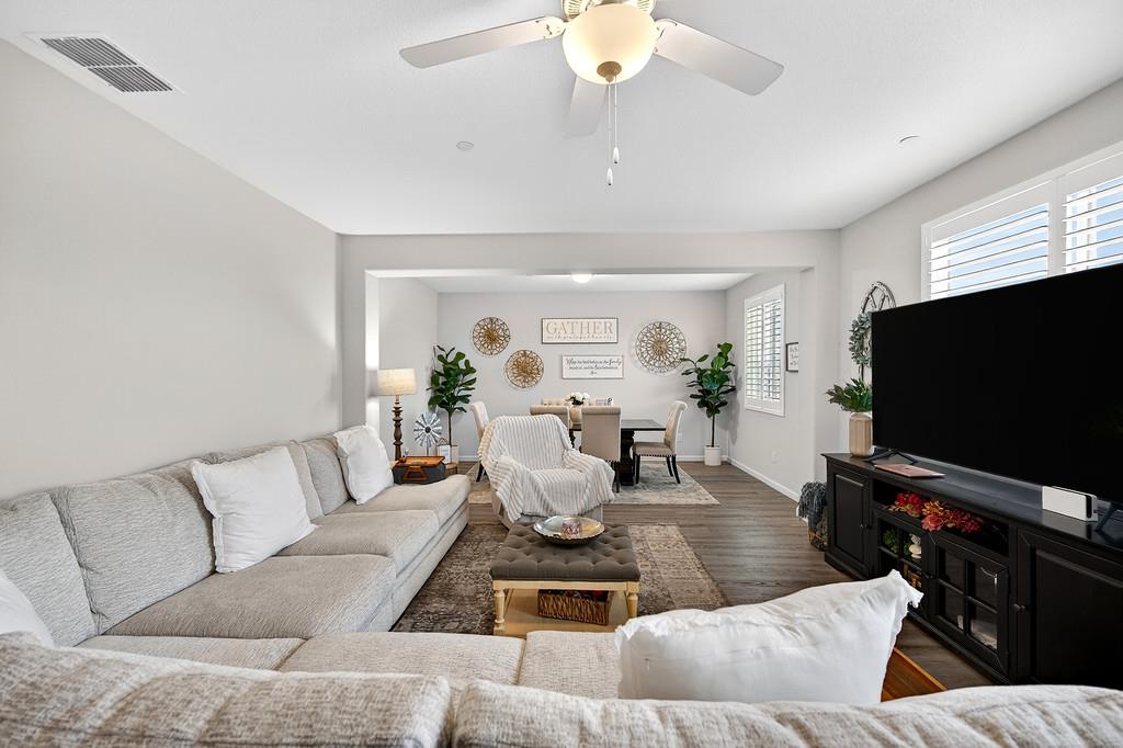 1397 Rio Grande Drive Plumas Lake, CA 95961 - Photo 7 of 54 a living room with furniture and a flat screen tv
