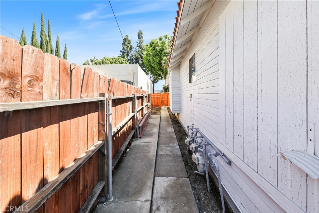 15323 Paramount Boulevard Paramount, CA 90723 - Photo 35 of 72 a view of balcony with wooden floor and stairs