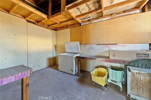 a view of a house with wooden deck