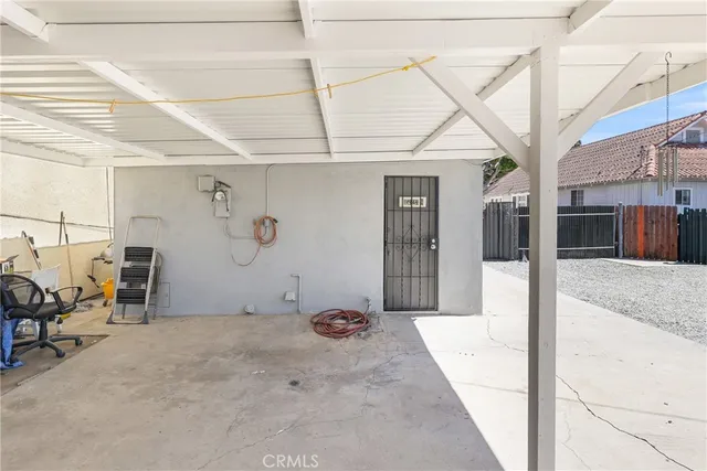 a view of a back yard of the house