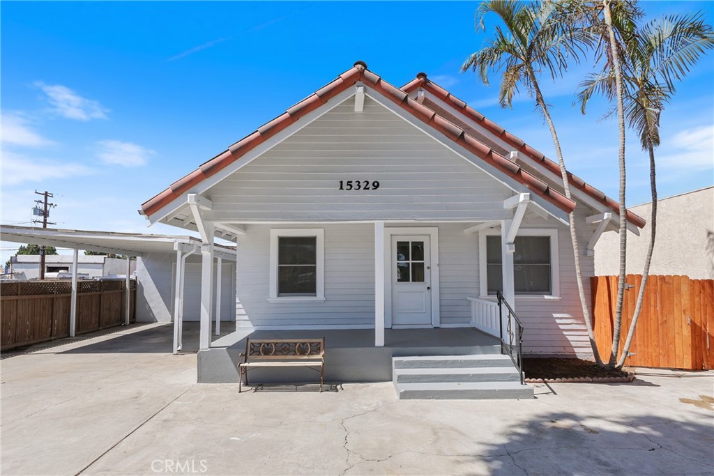 15323 Paramount Boulevard Paramount, CA 90723 - Photo 5 of 72 a house view with a outdoor space