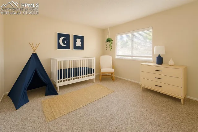a view of livingroom with furniture and windows