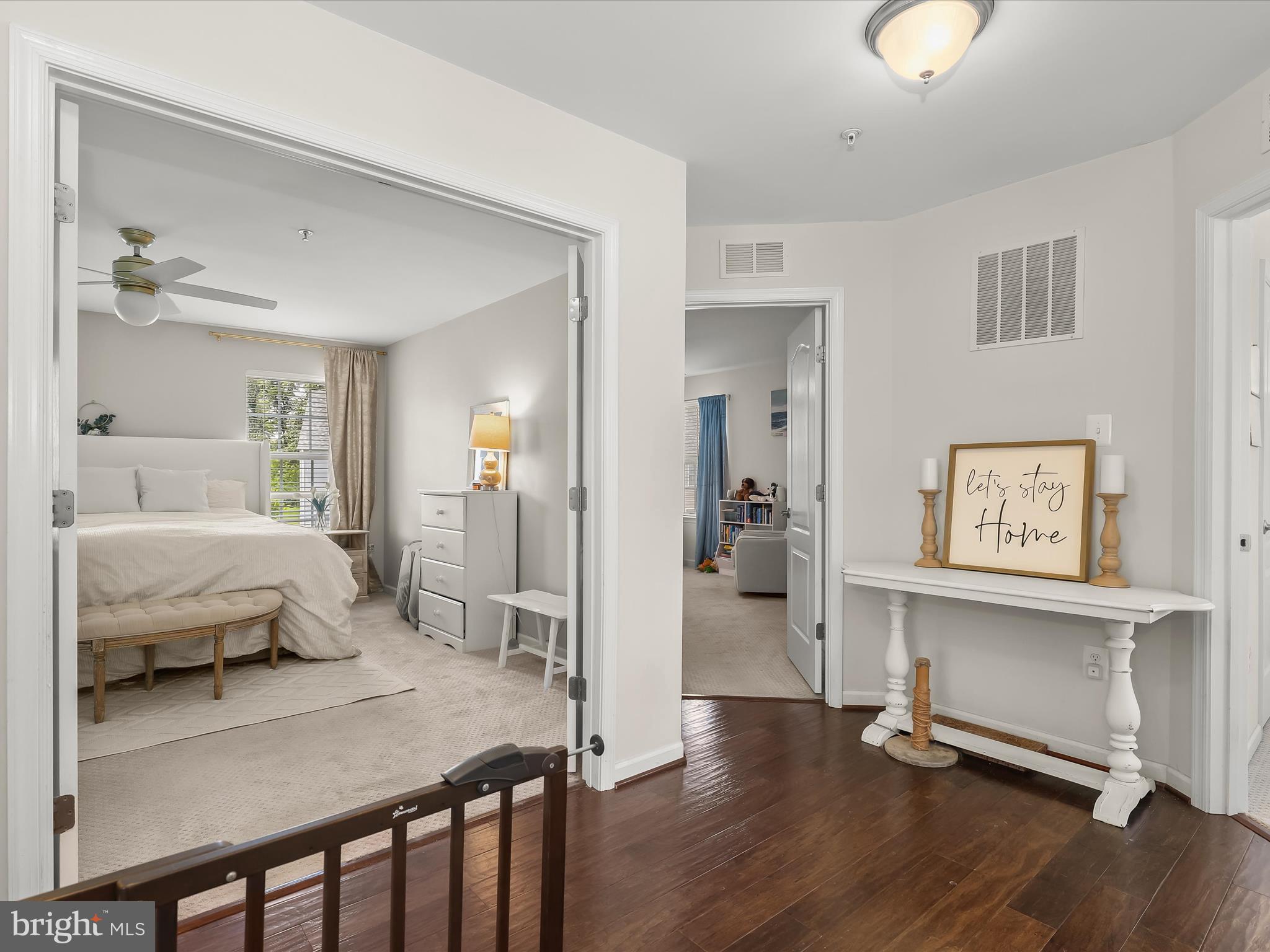 10508 Braddock Run Road Baltimore, MD 21220 - Photo 21 of 54 a bedroom with furniture and a wooden floor