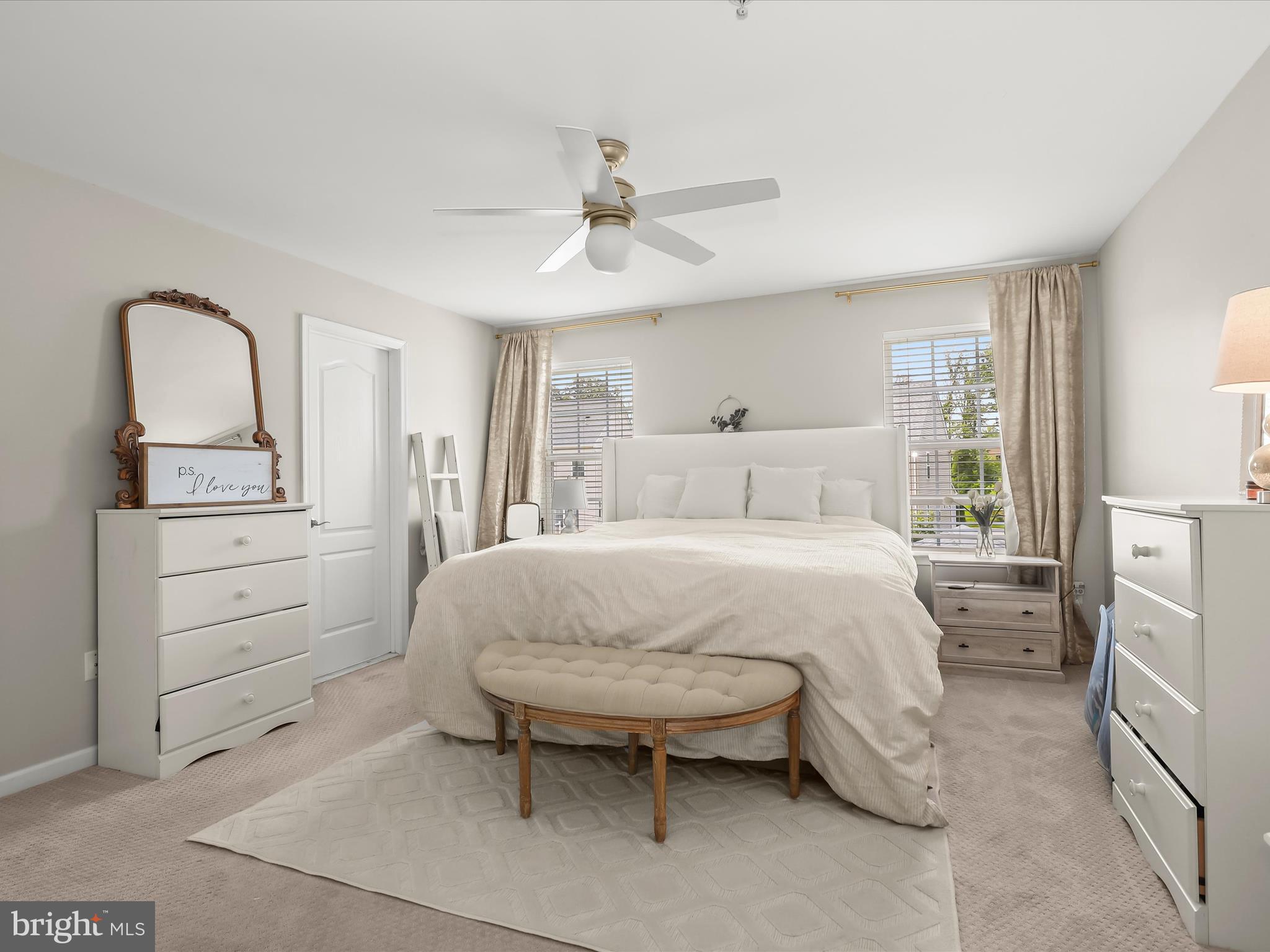 10508 Braddock Run Road Baltimore, MD 21220 - Photo 23 of 54 a bedroom with a bed and a dresser