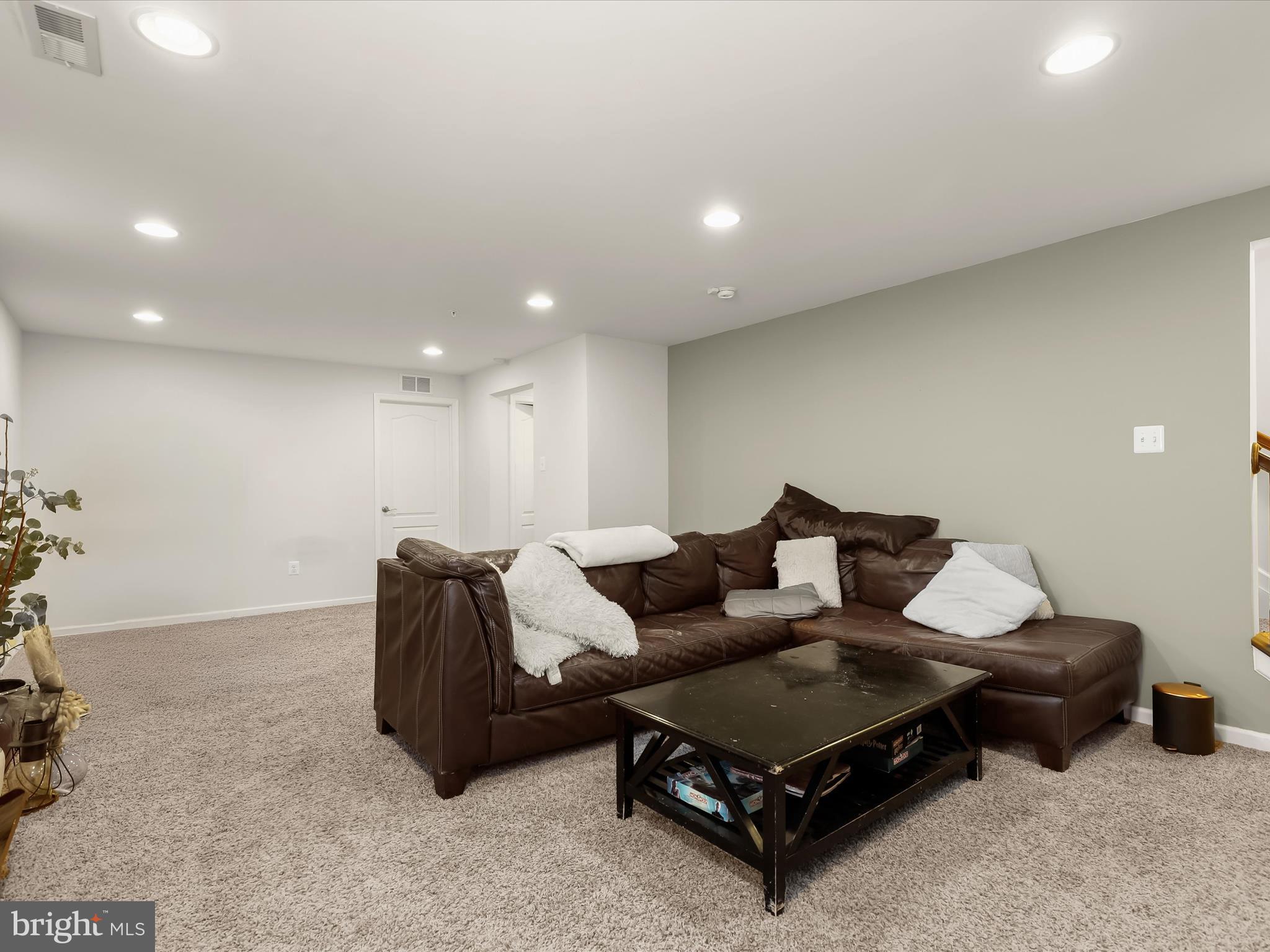 10508 Braddock Run Road Baltimore, MD 21220 - Photo 37 of 54 a living room with furniture