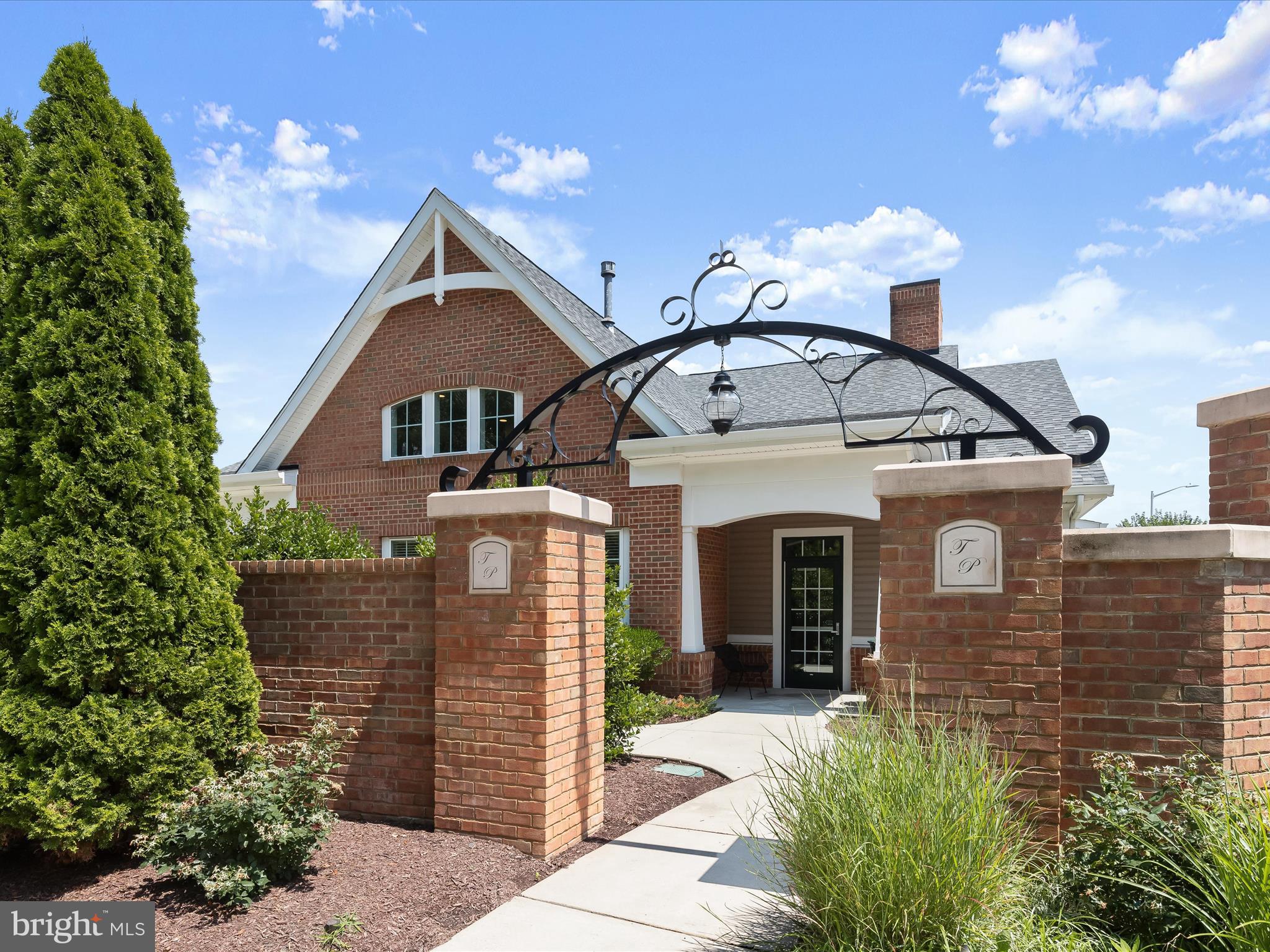 10508 Braddock Run Road Baltimore, MD 21220 - Photo 48 of 54 a front view of a house with a yard