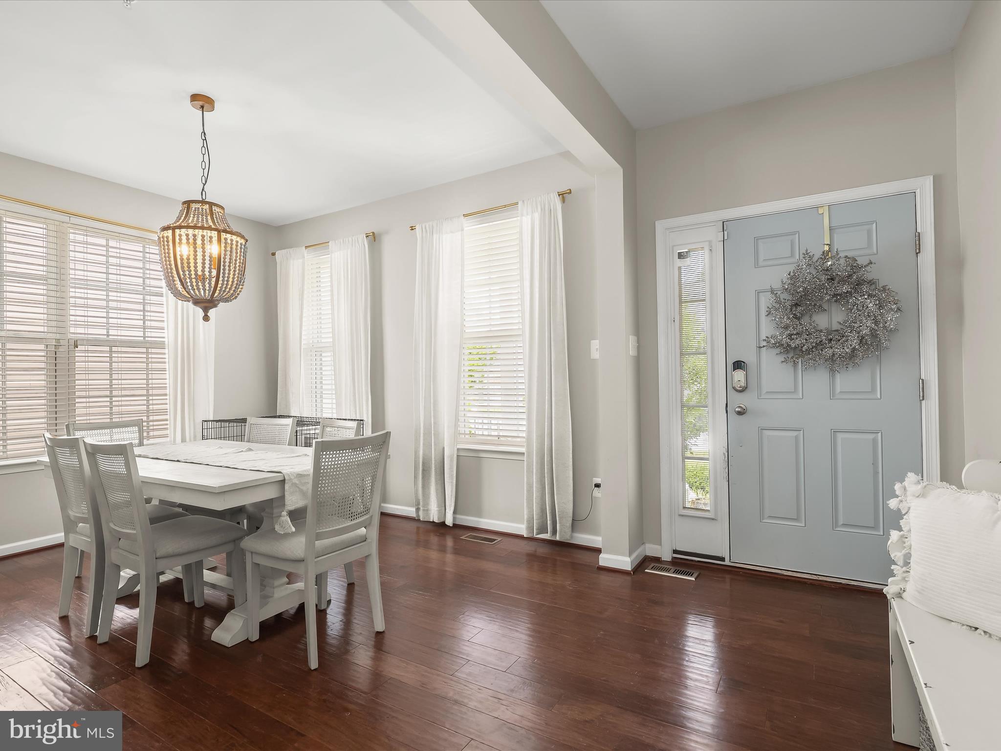 10508 Braddock Run Road Baltimore, MD 21220 - Photo 6 of 54 a view of a dining room with furniture window and wooden floor
