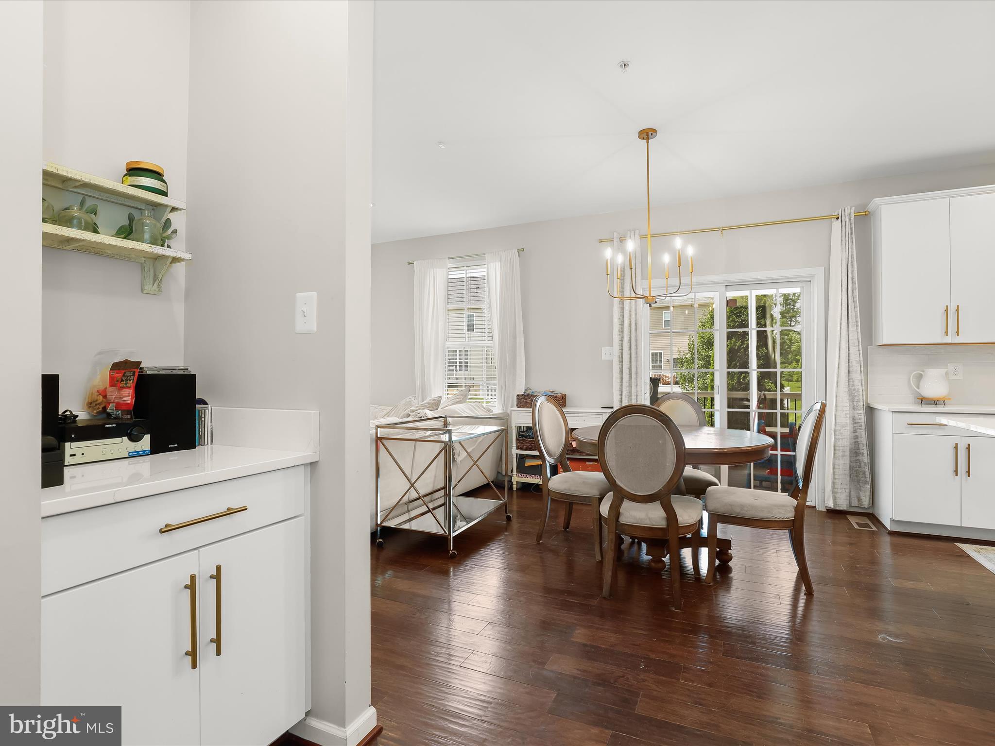10508 Braddock Run Road Baltimore, MD 21220 - Photo 50 of 54 a view of a dining room with furniture window and wooden floor