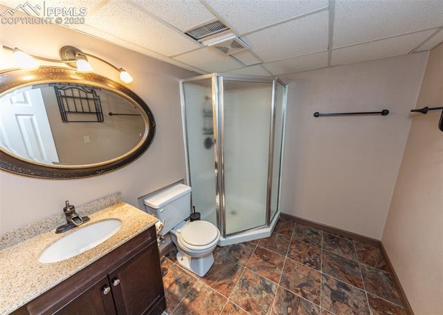 6727 Seneca Road Colorado Springs, CO 80915 - Photo 33 of 50 Very large bathroom with stand-alone shower in the basement. Recently painted!