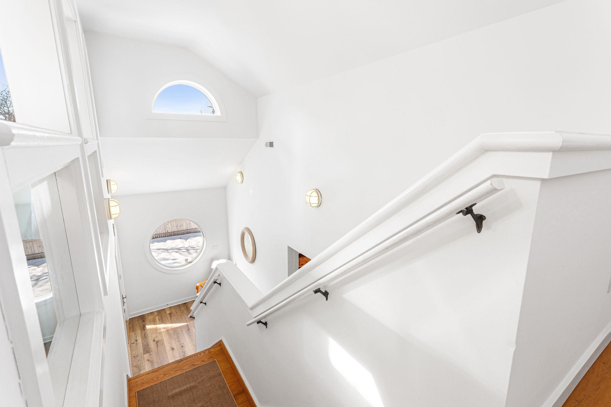 201 Lighthouse Avenue Cape May Point, NJ 08212 - Photo 26 of 32 a view of a livingroom with bathroom and mirror