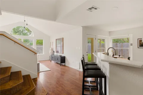 a living room with furniture and a table