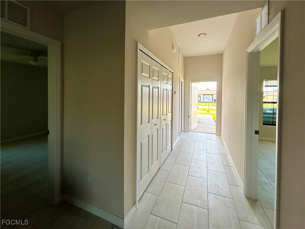 3610 Southwest 17th Avenue Cape Coral, FL 33914 - Photo 4 of 10 a view of a hallway