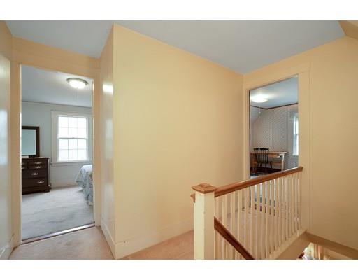 535 Maple Street Danvers, MA 01923 - Photo 14 of 23 a view of a hallway view with wooden floor and staircase