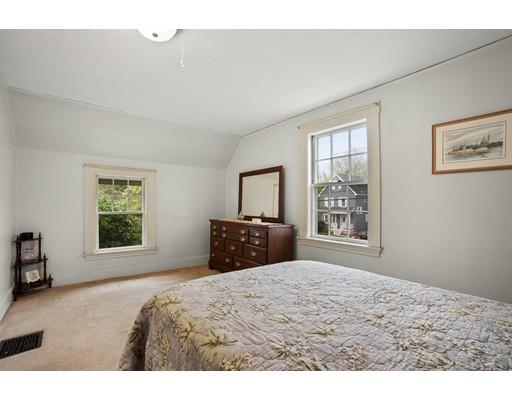535 Maple Street Danvers, MA 01923 - Photo 16 of 23 a bedroom with a bed and a window