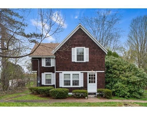 535 Maple Street Danvers, MA 01923 - Photo 2 of 23 a front view of a house with garden