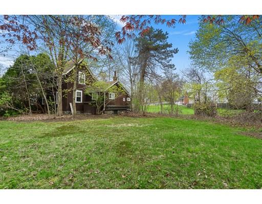 535 Maple Street Danvers, MA 01923 - Photo 21 of 23 a view of outdoor space with deck and tree
