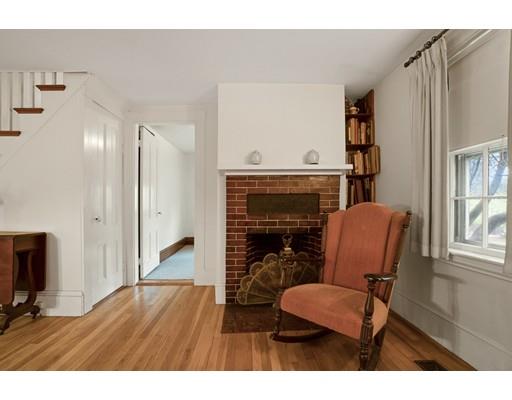 535 Maple Street Danvers, MA 01923 - Photo 3 of 23 a living room with furniture and a fireplace