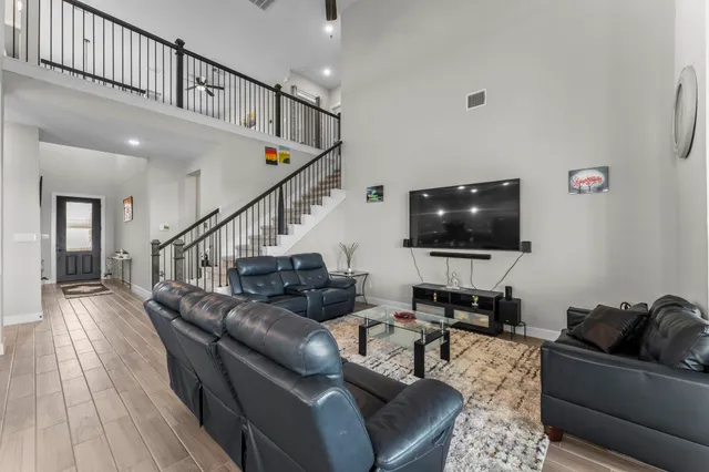 a view of a dining room with furniture and window