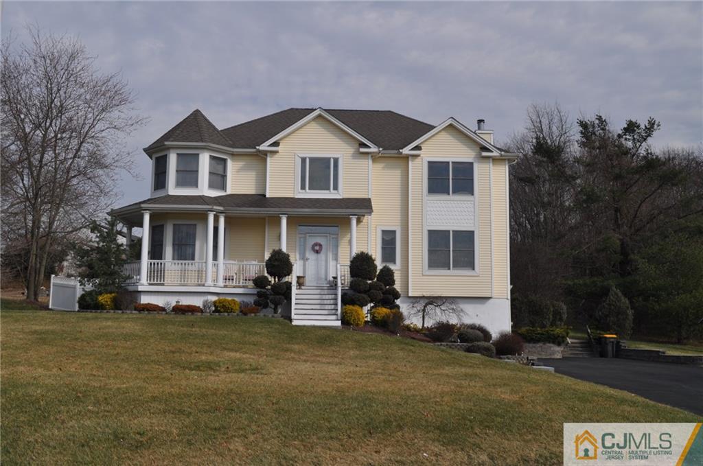 102 Spring Hill Road Old Bridge, NJ 07747 - Photo 1 of 1 a front view of a house with a yard