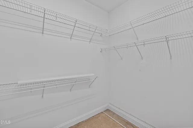 a view of a room with racks on the wall