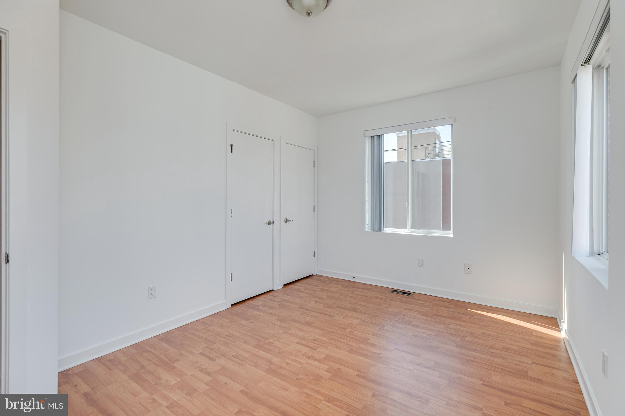 220 West George Street, Unit 224 Philadelphia, PA 19123 - Photo 31 of 56 a view of empty room with wooden floor and fan