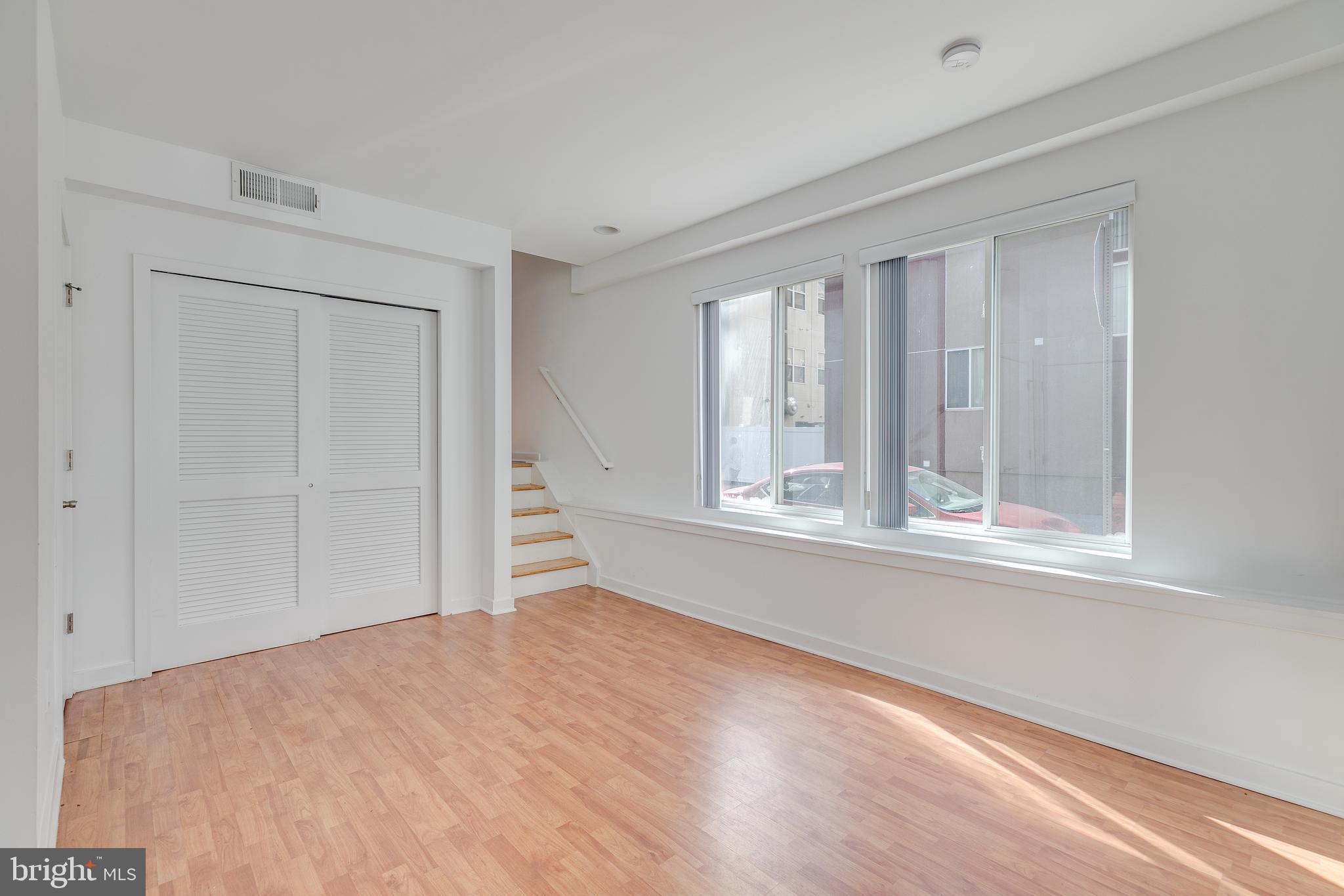 220 West George Street, Unit 224 Philadelphia, PA 19123 - Photo 42 of 56 a view of empty room with wooden floor and fan