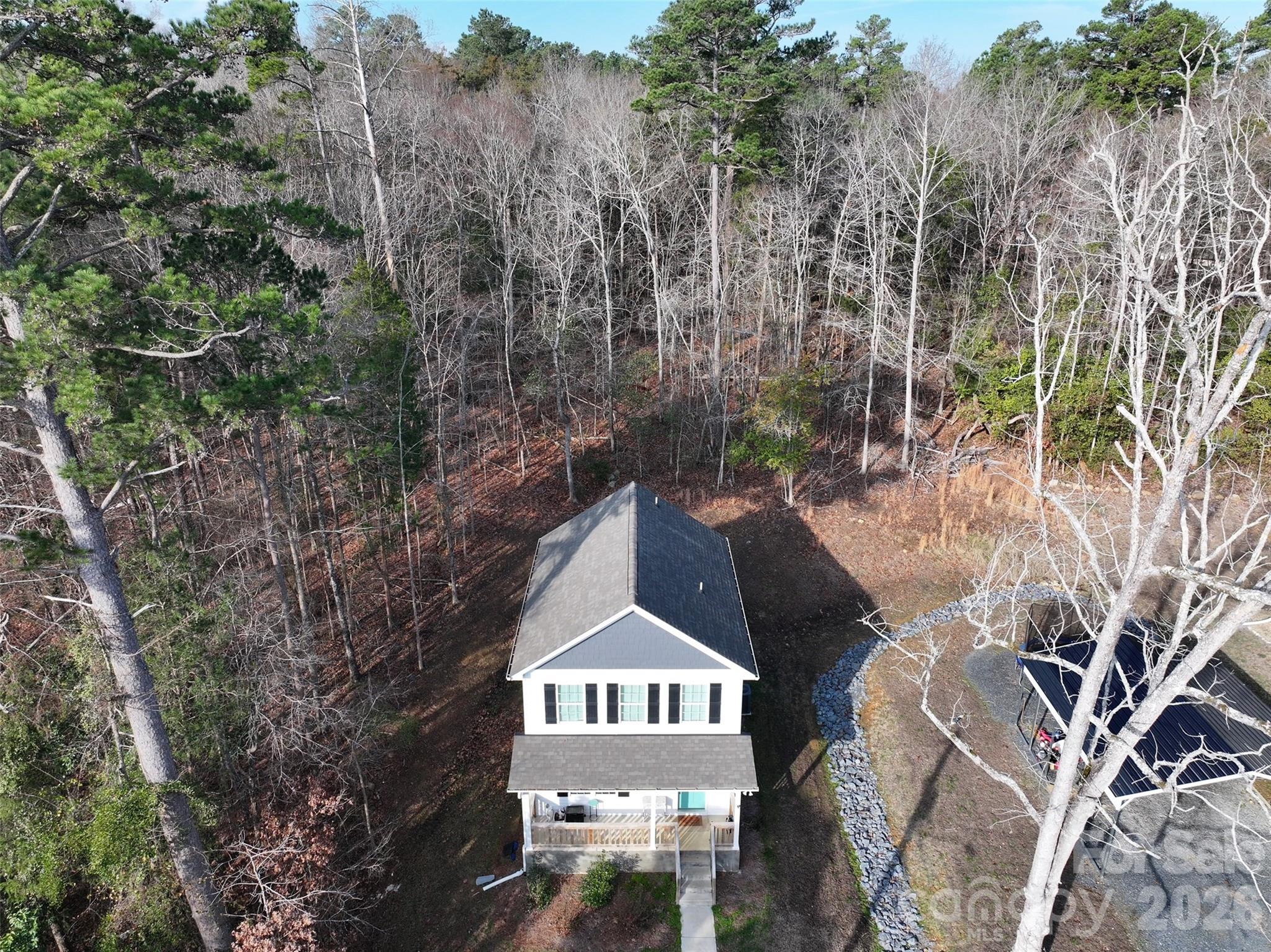518 Lake Head Road Norwood, NC 28128 - Photo 39 of 39 a view of a city with tall trees