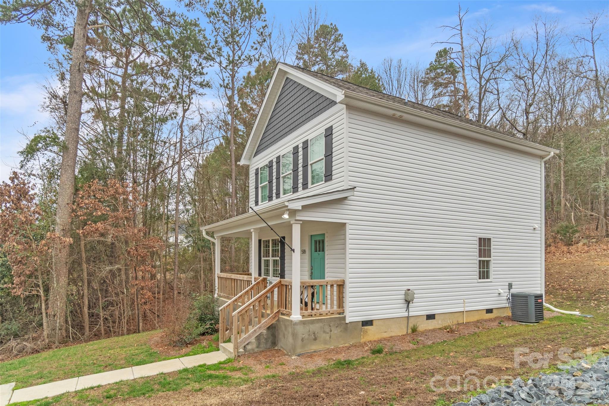 518 Lake Head Road Norwood, NC 28128 - Photo 6 of 39 a view of a house with a yard and large tree
