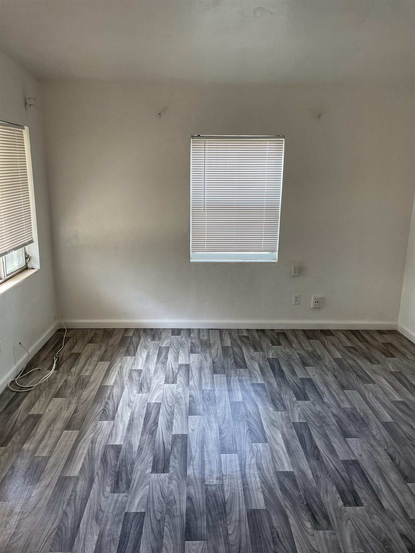 6 Christopher Street St. Augustine, FL 32084 - Photo 11 of 14 a view of a room with wooden floors and window