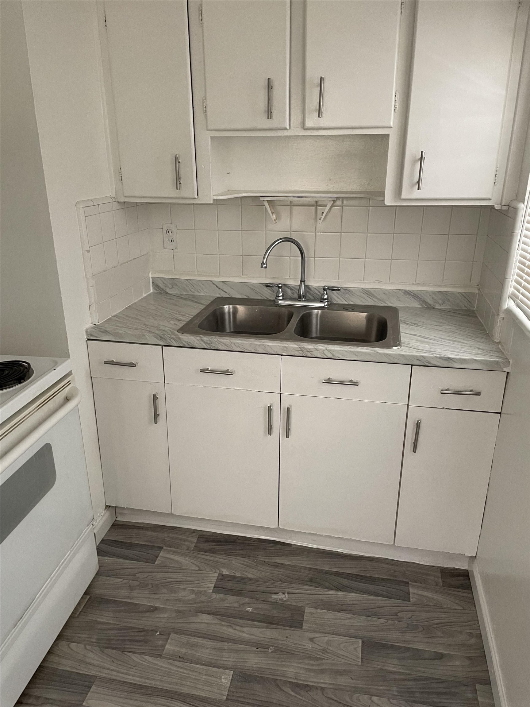 6 Christopher Street St. Augustine, FL 32084 - Photo 8 of 14 a kitchen with a sink cabinets and appliances