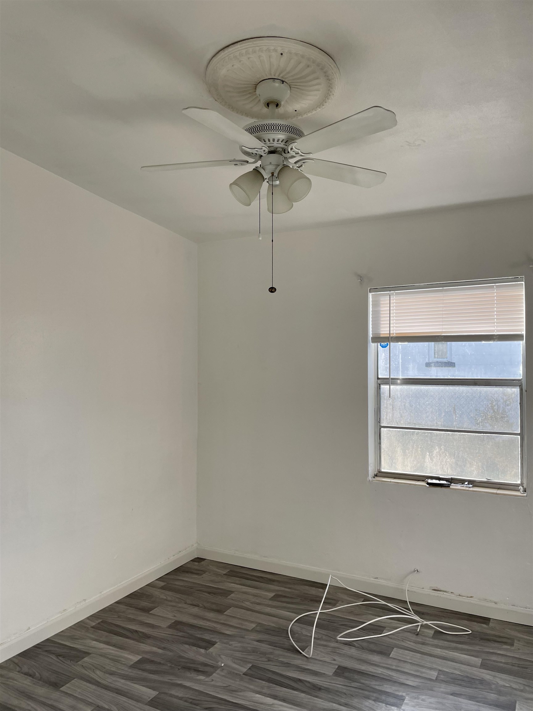 6 Christopher Street St. Augustine, FL 32084 - Photo 10 of 14 a view of a room with rack and wooden floor