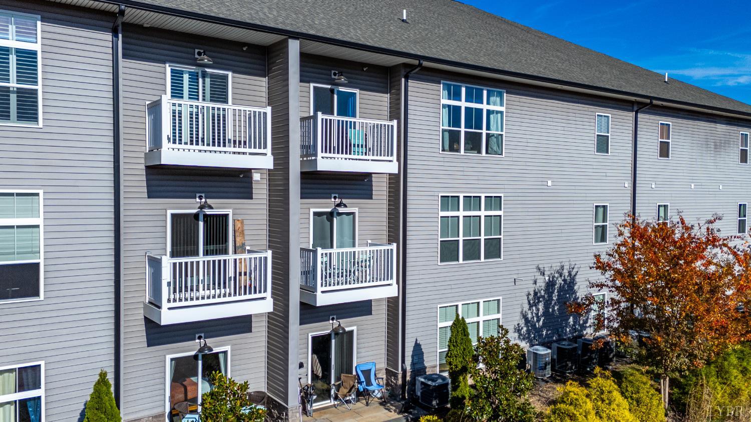 1301 Stoney Ridge Boulevard, Unit 105 Forest, VA 24551 - Photo 31 of 31 a front view of a building with a lot of windows