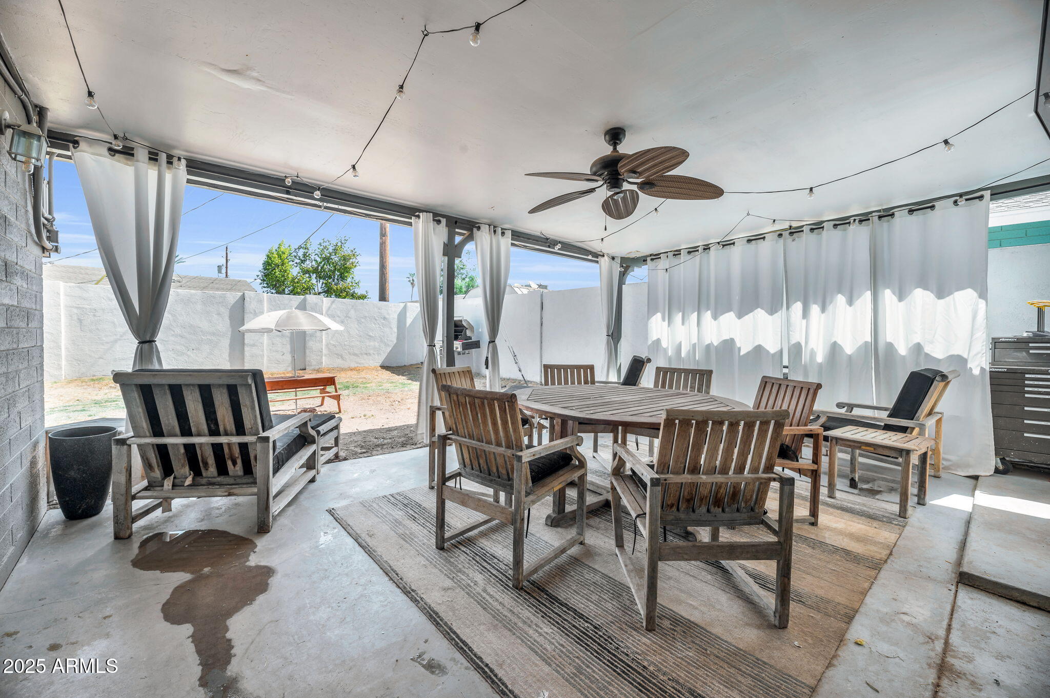 4928 East Palm Lane Phoenix, AZ 85008 - Photo 15 of 17 a view of a dining room with furniture window and outside view