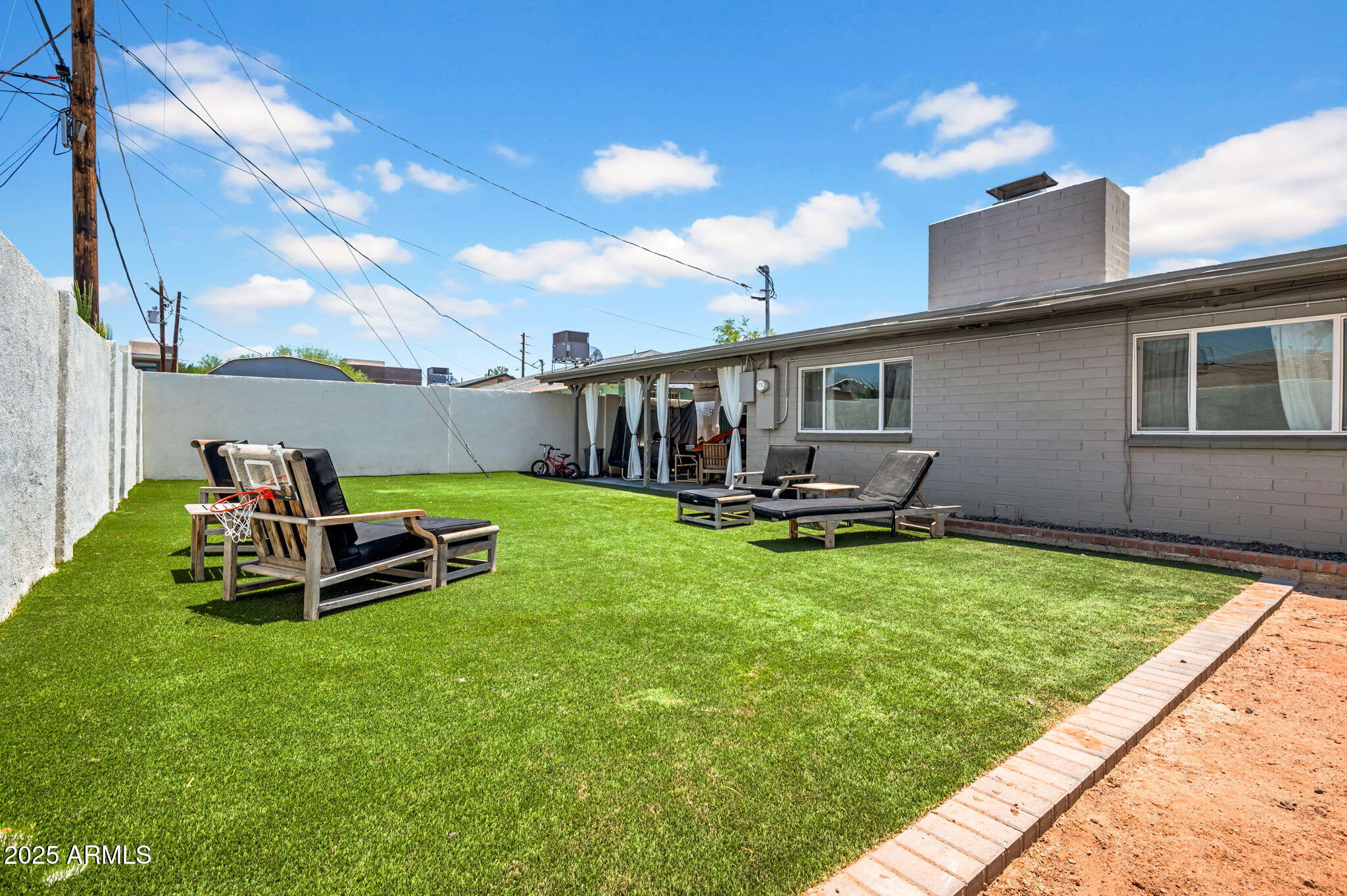 4928 East Palm Lane Phoenix, AZ 85008 - Photo 17 of 17 a house view with a garden space