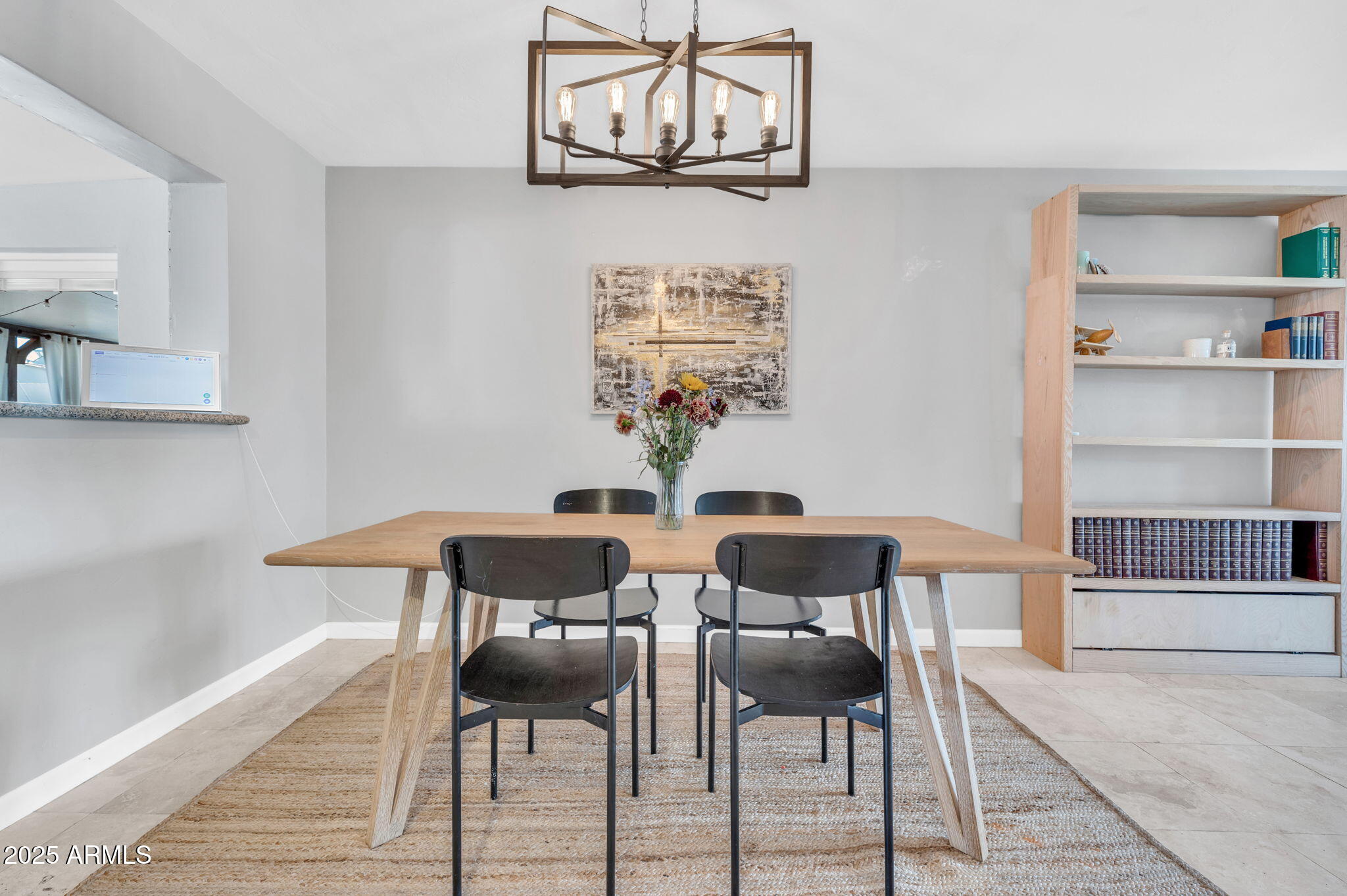 4928 East Palm Lane Phoenix, AZ 85008 - Photo 4 of 17 a view of a dining room with furniture and wooden floor