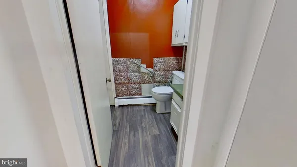 a bathroom with a sink and a toilet