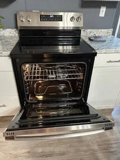 a room that has a bed and a window in it