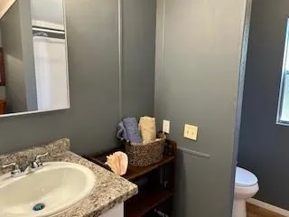 a bathroom with a bathtub and shower