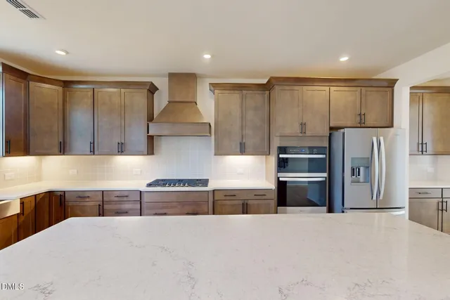 a view of room with window and ceiling fan