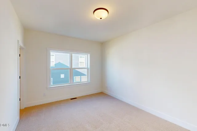 a bathroom with a sink a toilet a shower and a mirror