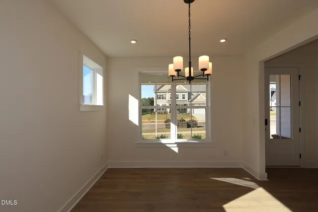 a view of a kitchen with windows