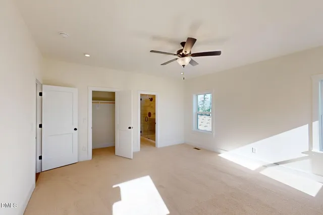 a view of an empty walk in closet