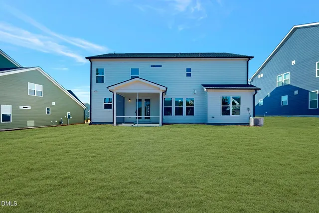 a kitchen with stainless steel appliances granite countertop lots of counter top space and wooden floor
