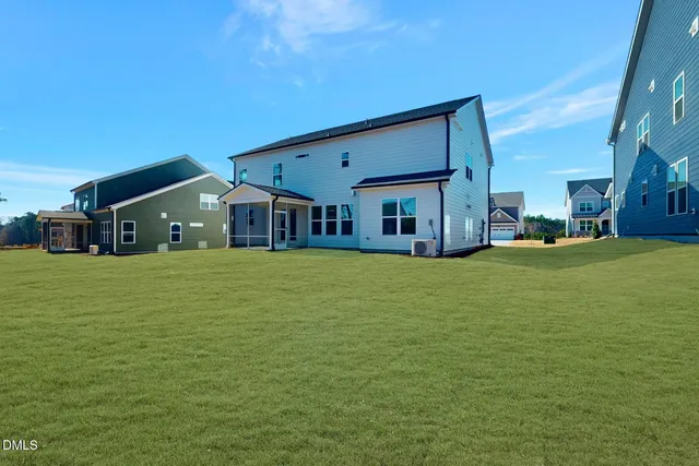 a kitchen with stainless steel appliances a refrigerator sink and cabinets